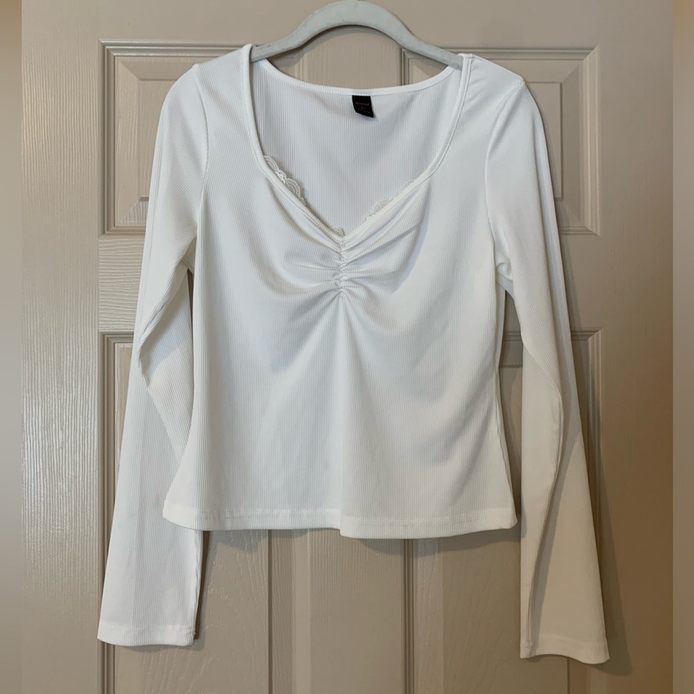 White long sleeve top